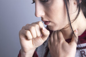 girl coughing disease