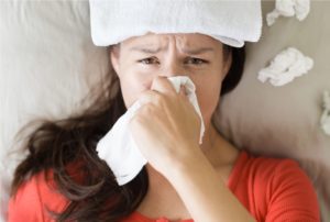 Sick woman coughing